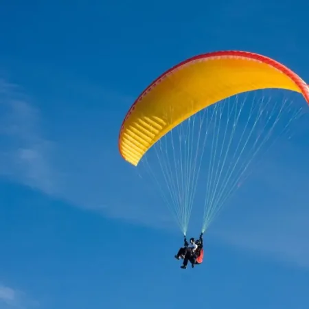 tandem paragliding from side